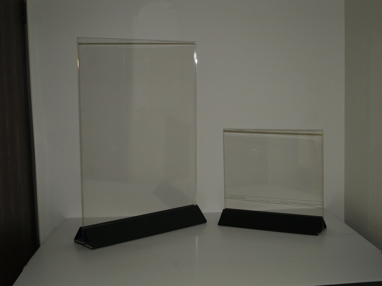Clear acrylic sign holder with black base - 3 sizes