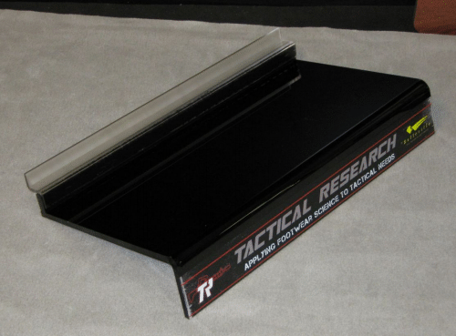 Black shelf with clear front sign insert